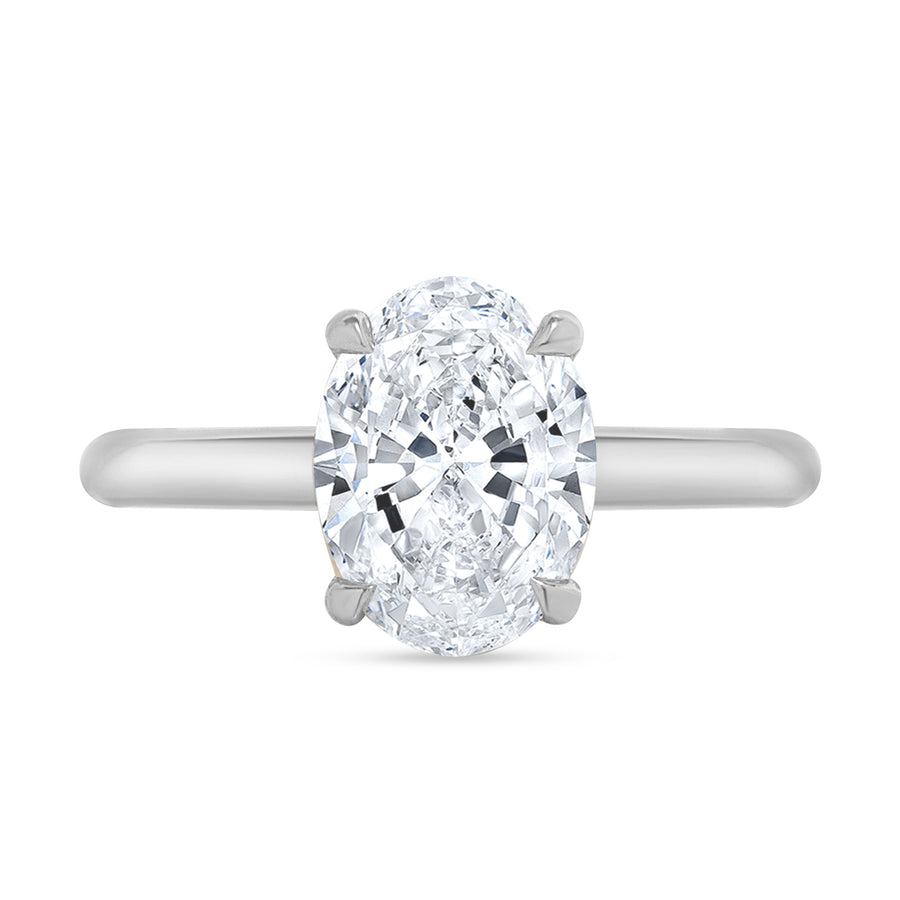 hidden halo oval engagement ring white gold