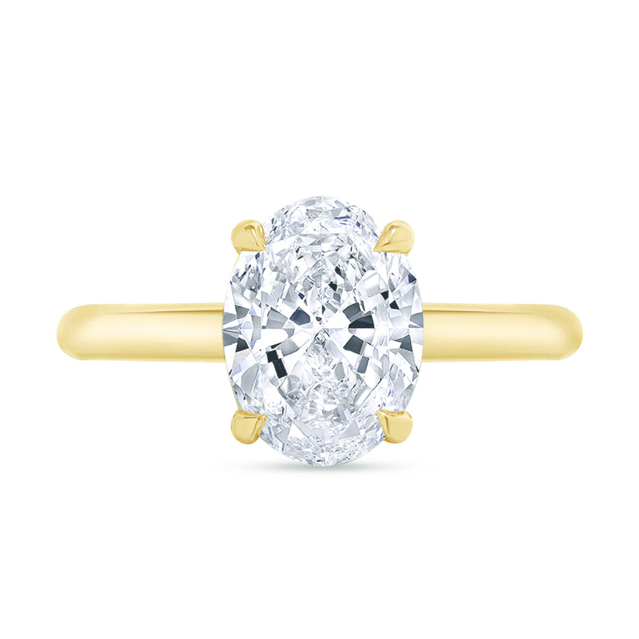 hidden halo oval engagement ring gold