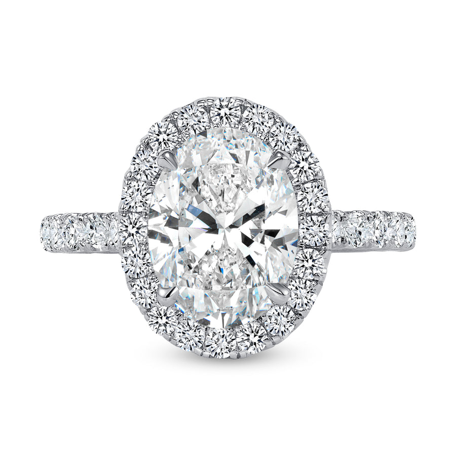 oval diamond halo engagement ring white gold