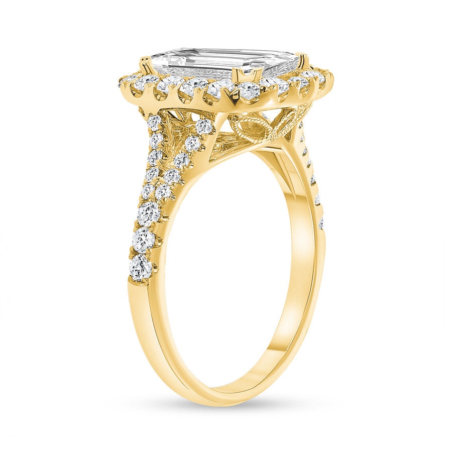 emerald cut diamond halo engagement ring yellow gold