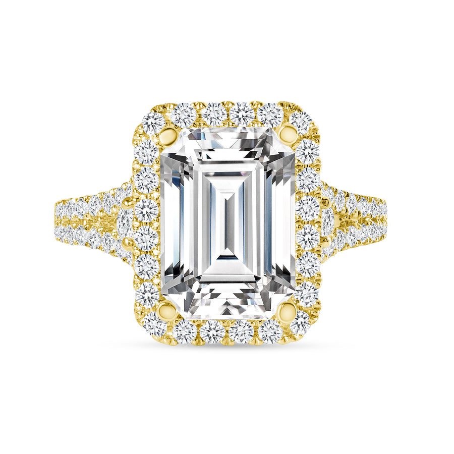 emerald & round diamond engagement ring yellow gold