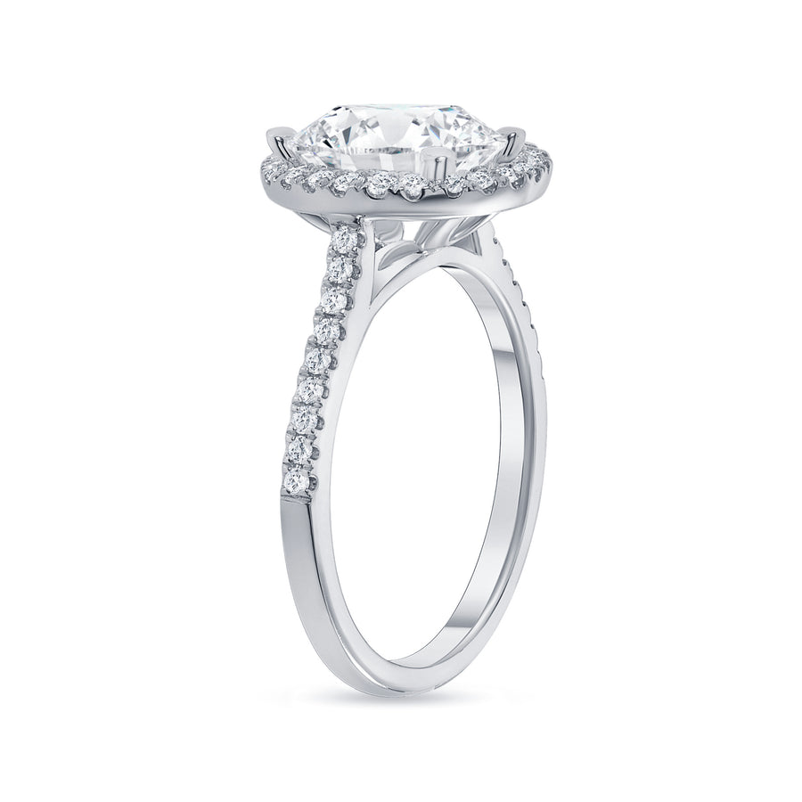 oval cut diamond halo engagement ring with prongs white gold
