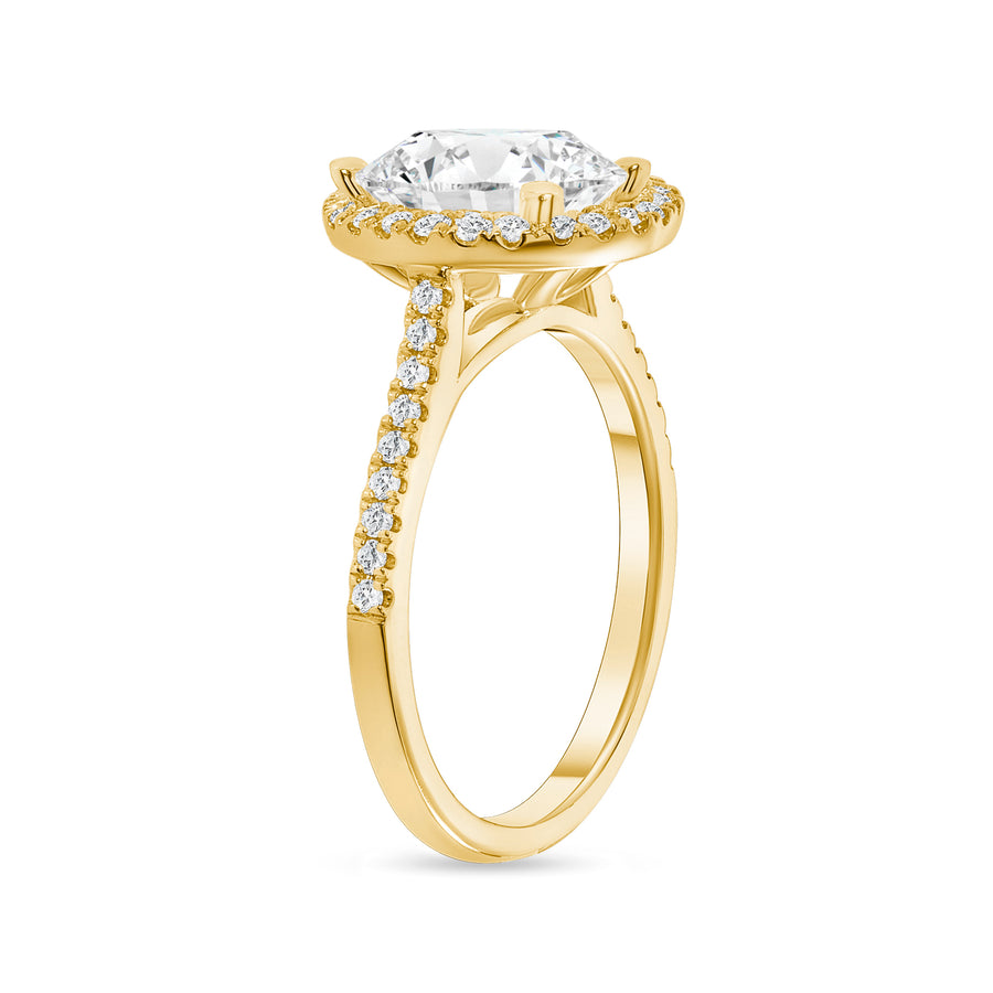 oval cut diamond halo engagement ring with prongs yellow gold