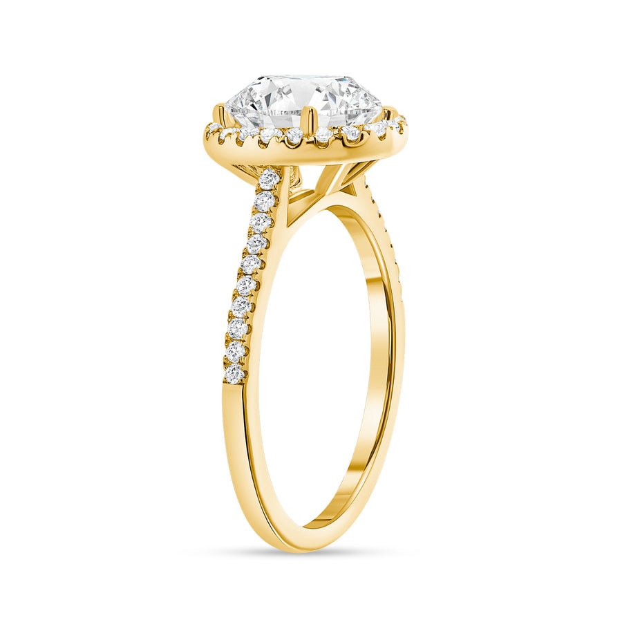 classic oval cut diamond halo engagement ring yellow gold
