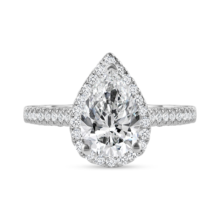 large pear shaped & small round diamond engagement ring white gold